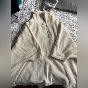 White poncho style sweater